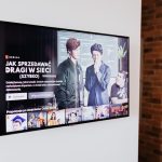 OLED vs Mini LED TVs: Which Technology Should You Buy in 2026? Smart TV displaying streaming content in living room