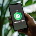 Proton VPN Review 2026: Is the Privacy First VPN Worth It? Smartphone showing VPN Protected status — Proton VPN Review